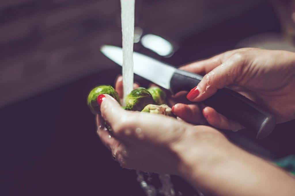 cutting washing brussels sprout