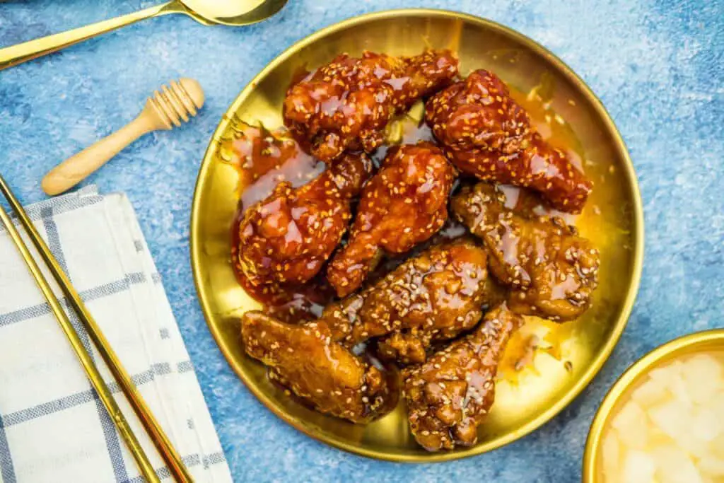 Deep Fried Chicken Wings or Barbecue Sprinkled With White Sesame