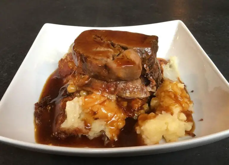Slow-Baked Beef Brisket on Potato Mash and Covered With Gravy Recipe