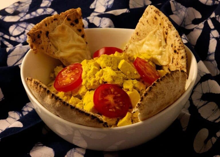 Vegan Eggs With Pita Vegan Cheese Toast Triangles and Tomato Slices Recipe