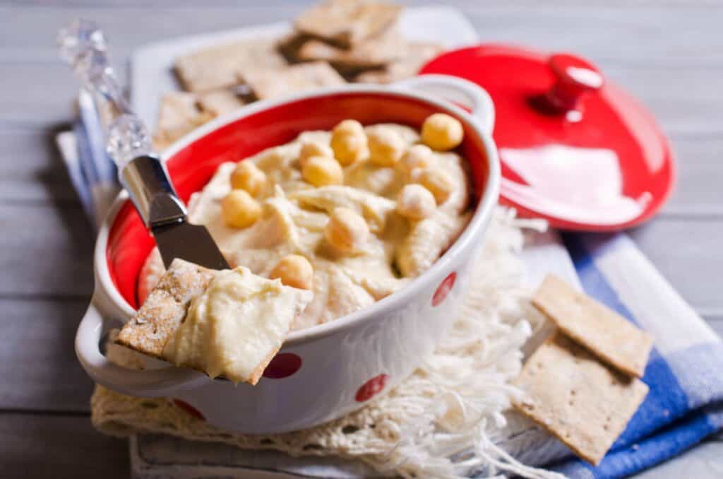 Traditional Hummus With Chickpeas and Dry Pieces of Pita Recipe