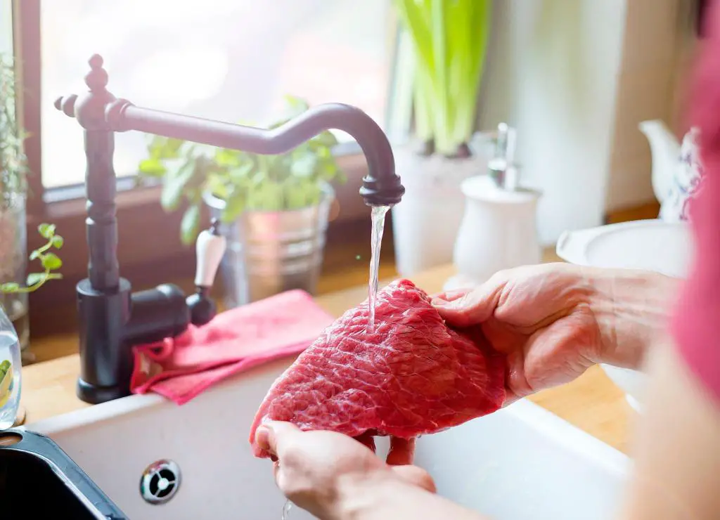 washing meat before cooking