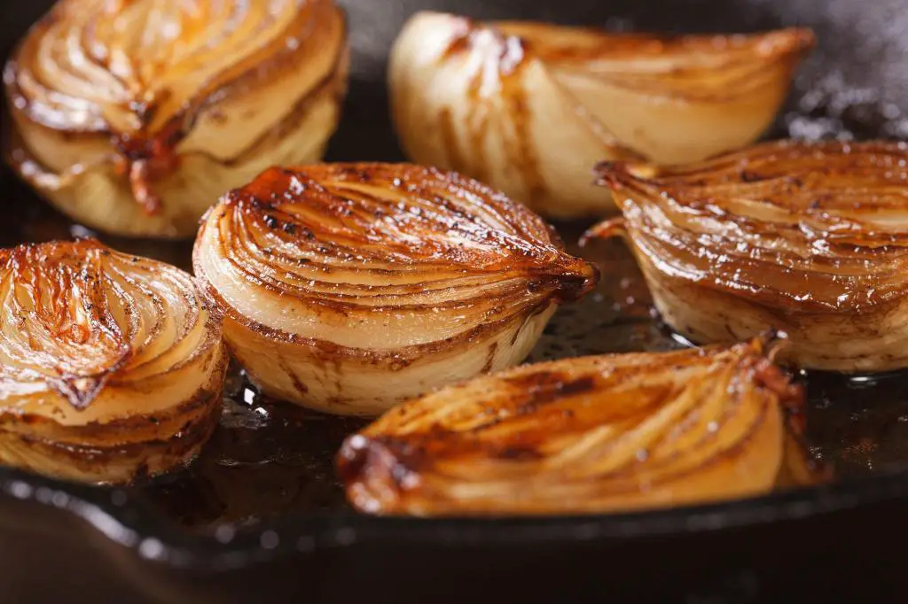 caramelized onion halves with balsamic vinegar