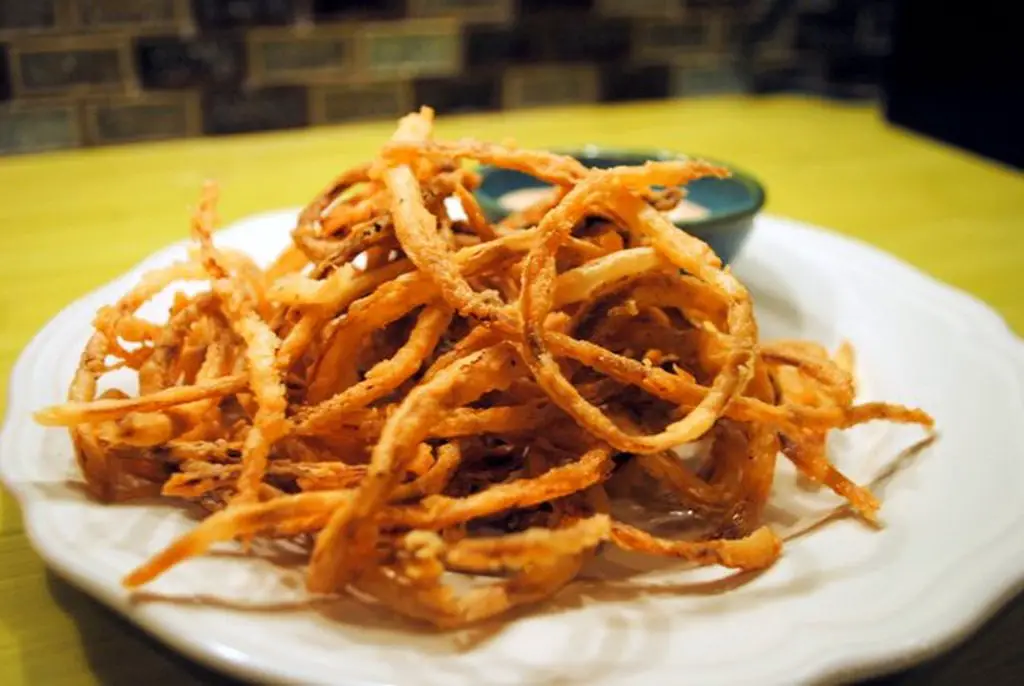 frizzled fried onions on plate