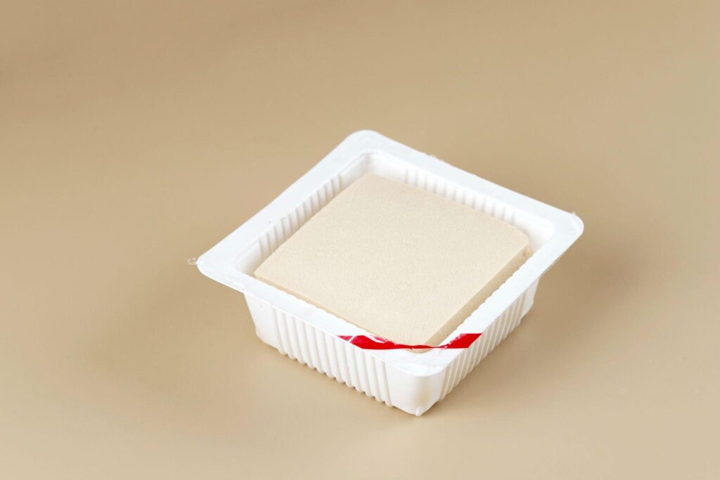 silk smooth tofu on plastic