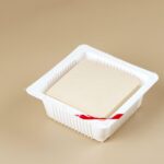 silk smooth tofu on plastic