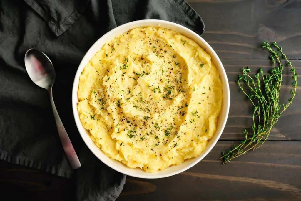mashed potatoes with fresh thyme and black pepper