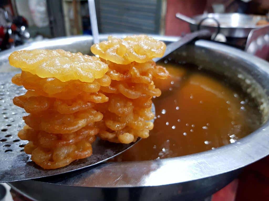 cooked jalebi is displayed to serve and sell