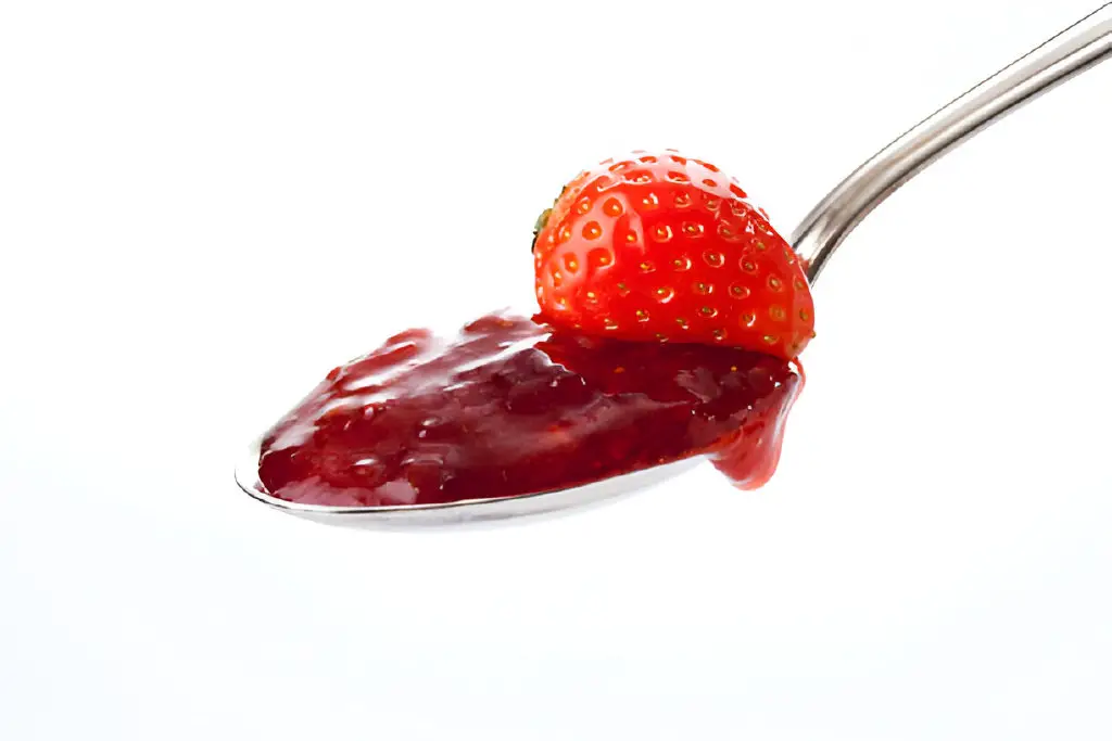 spoon with strawberry jam