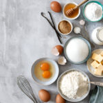 flour eggs sugar butter milk and spices baking ingredients