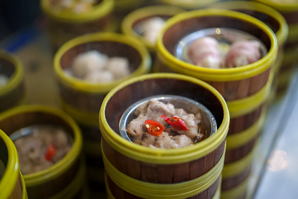 variety choice of chinese dim sum in bamboo steamers