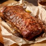 bbq baby back pork ribs in butcher paper