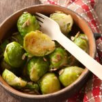 cooked brussels sprouts in rustic bowl