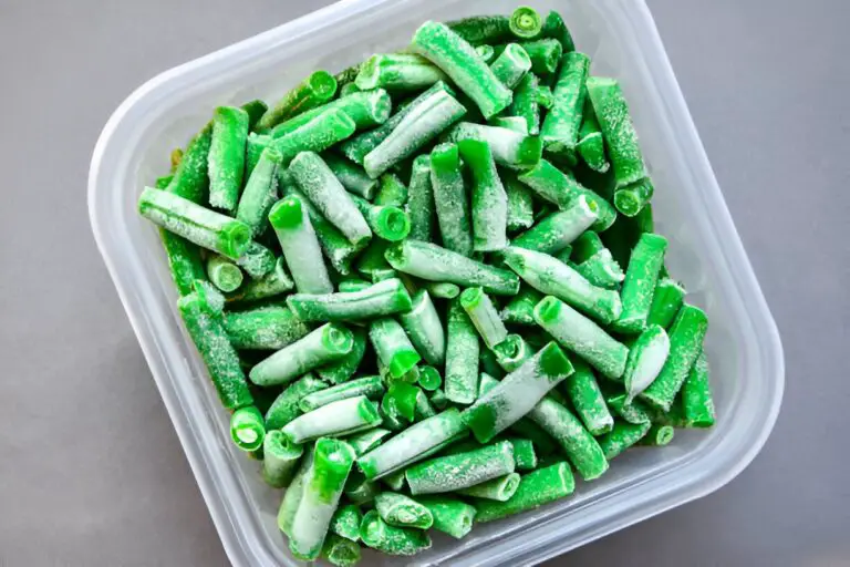 frozen green beans in a plastic-container-for-long-term storage deep freezing