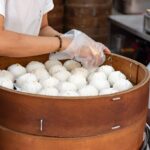 large tray of steamed bread after being baked