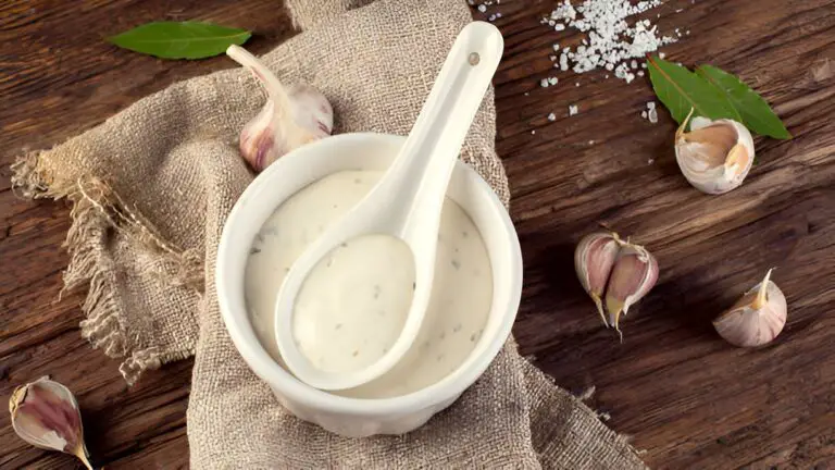 bowl of garlic sauce or mayonnaise