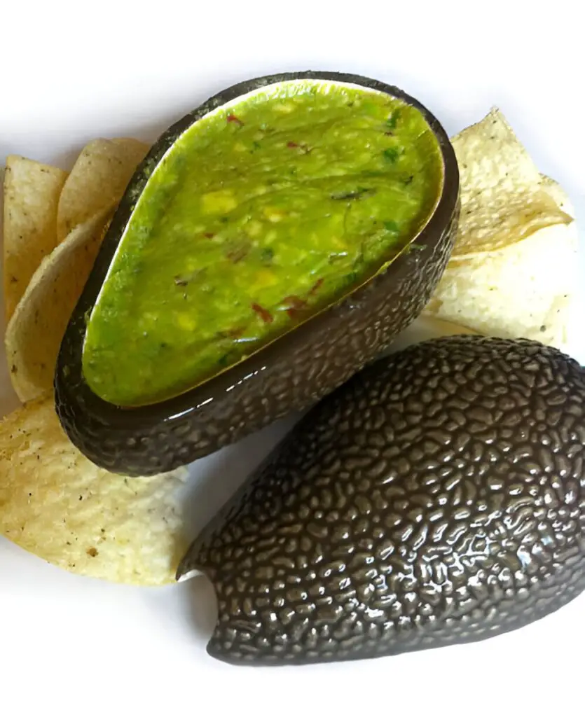 healthy guacamole in avocado bowl
