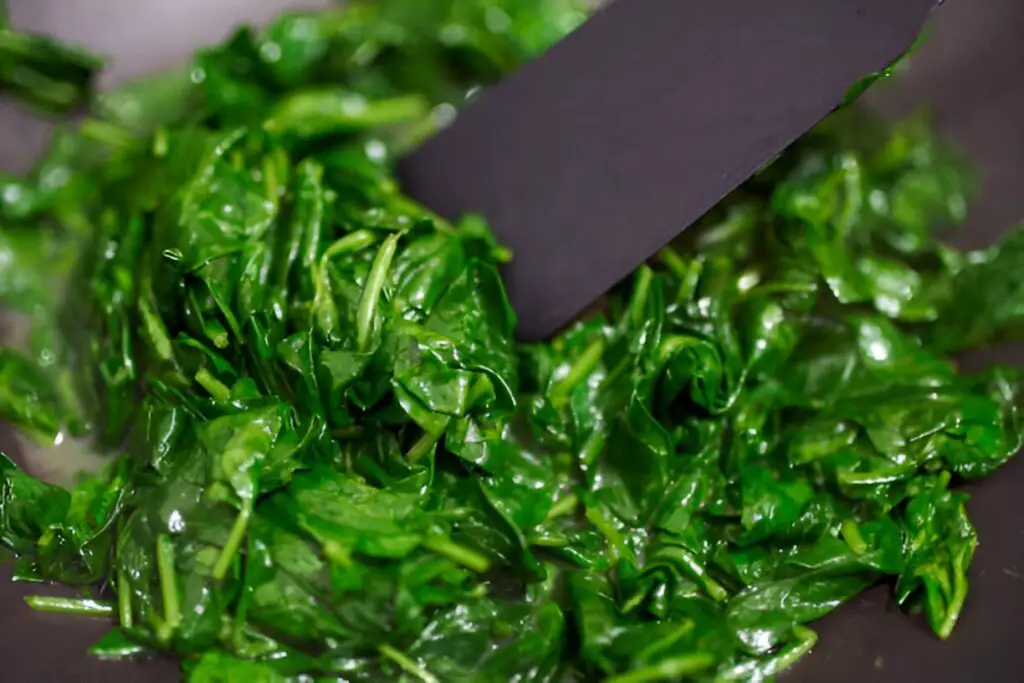baby spinach cooked in the pan