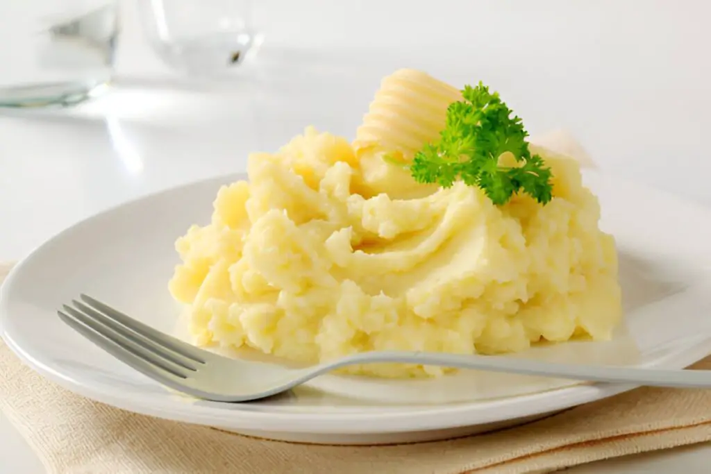 mashed potatoes served on white ceramic plate