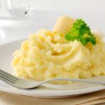 mashed potatoes served on white ceramic plate