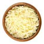 shredded mozzarella pizza cheese in wooden bowl