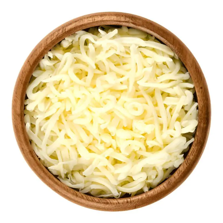 shredded mozzarella pizza cheese in wooden bowl