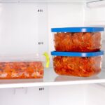 frozen stewed cabbage in a-container in the refrigerator